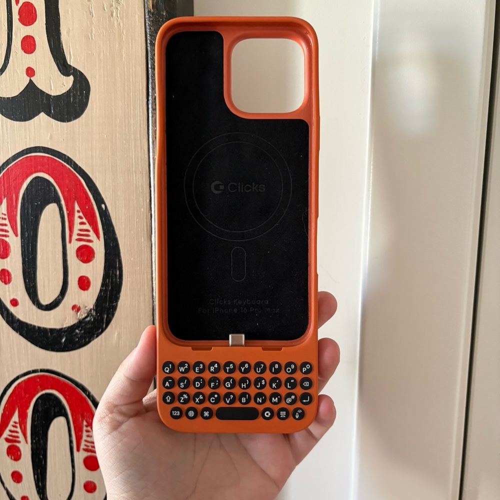 Orange Smartphone with Keyboard Case